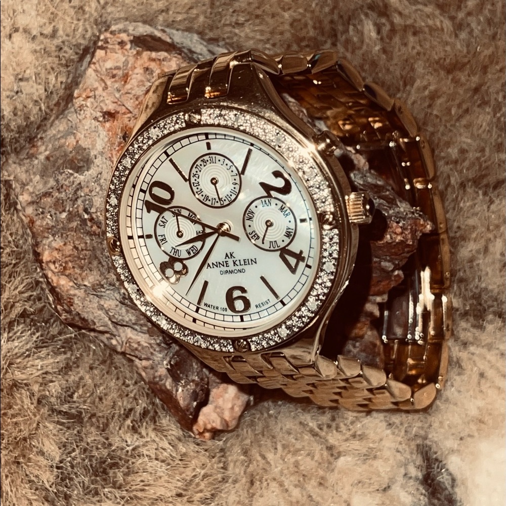 Anne Klein Gold Tone Womens Watch with Diamond accents. 7- 7 1/2" Bracelet